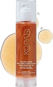- Kopari Sun Shield Body Glow, Broad Spectrum SPF 30, Lightweight Shimmering Gel Texture Absorbs Quickly, Non Sticky, Glowing Results, Golden Amber 5 oz